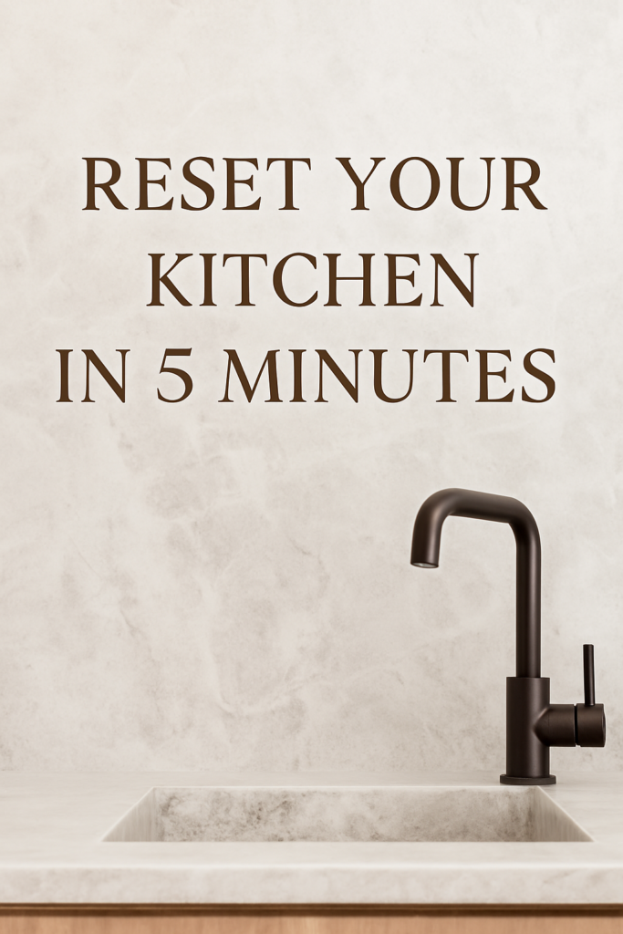 Minimal kitchen counter with a modern bronze faucet and marble sink, representing a simple kitchen reset routine for busy moms.